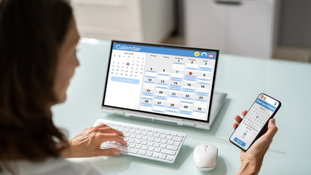 Salon owner reviewing a weekly calendar to spot peak and slow booking hours