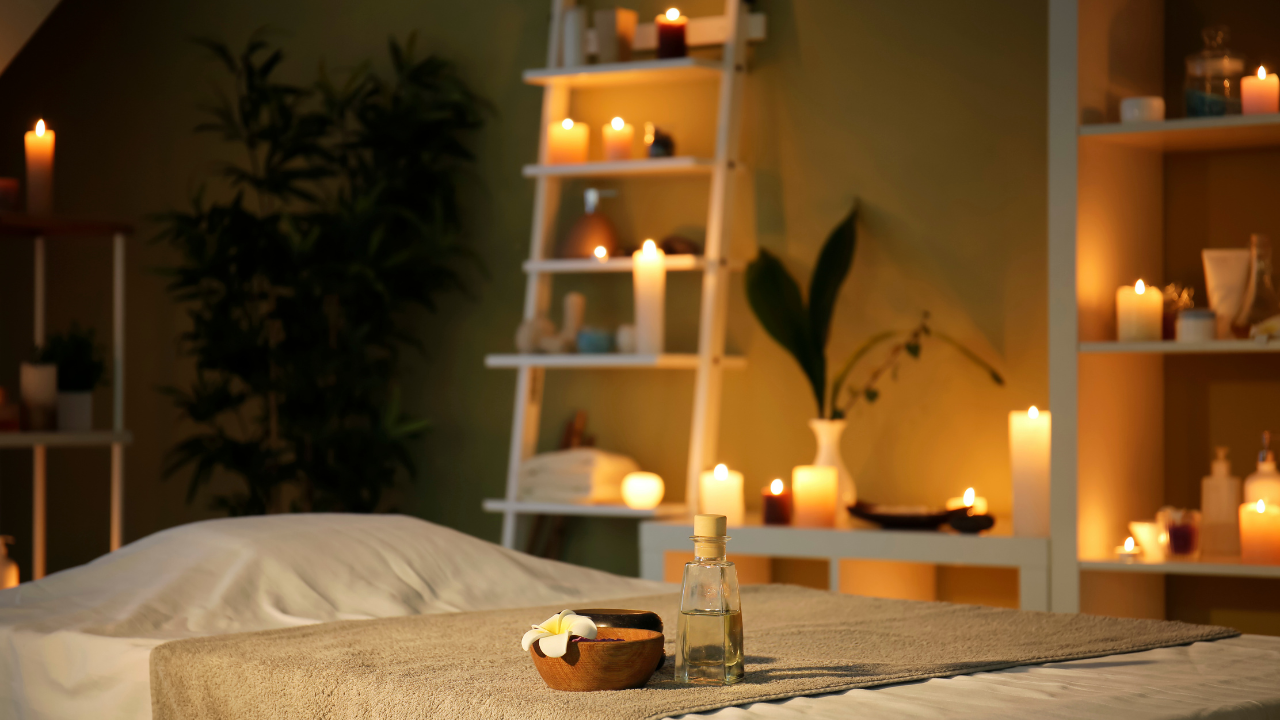 Bright, modern salon with warm lighting, tidy stations, and subtle scent cues